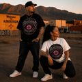 Models wearing black and white BURQUE Originals Pink Zia Signature T-shirts in Albuquerque, New Mexico